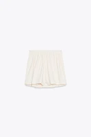 PLEATED MINI SKORT