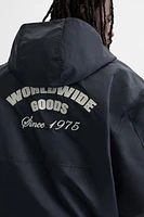 HOODED TECHNICAL JACKET