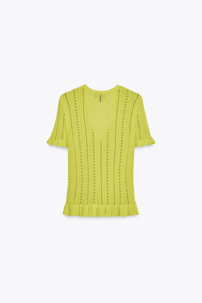 GILET EN MAILLE POINTELLE À VOLANTS