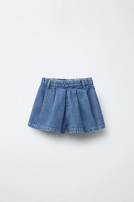 BERMUDA EN DENIM À PLIS PLATS