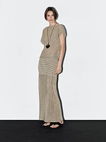 Long pleated skirt with flecked detail
