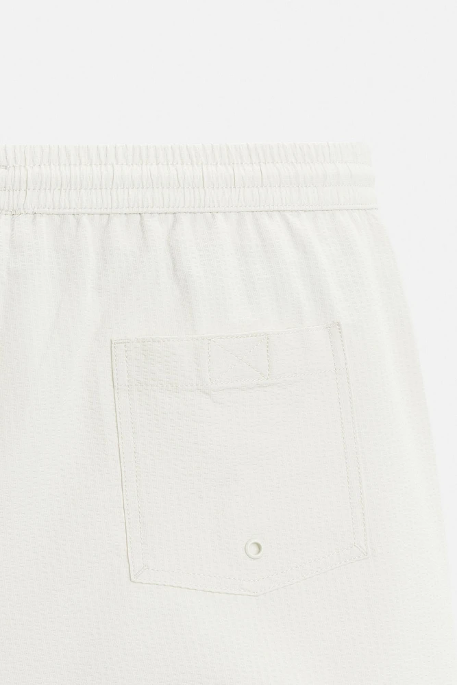 MAILLOT DE BAIN MI-LONG EN SEERSUCKER