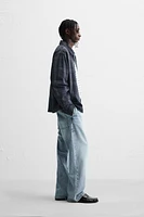 VESTE À CARREAUX ZIPPÉE