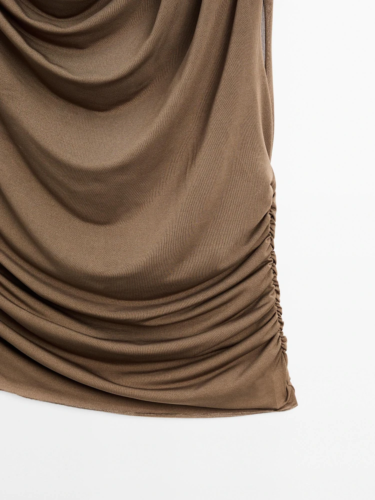 Asymmetric top with draped detail
