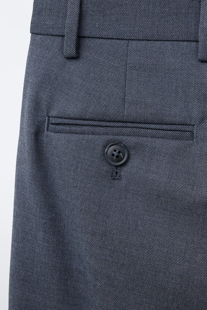 TEXTURED SUIT PANTS