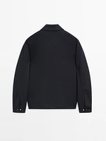 Jacket with adjustable hem detail