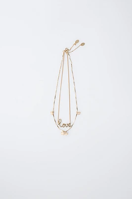 TWO-PACK OF FLOWER AND LOVE NECKLACES