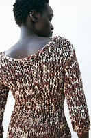 COMBINATION KNIT PEPLUM SWEATER