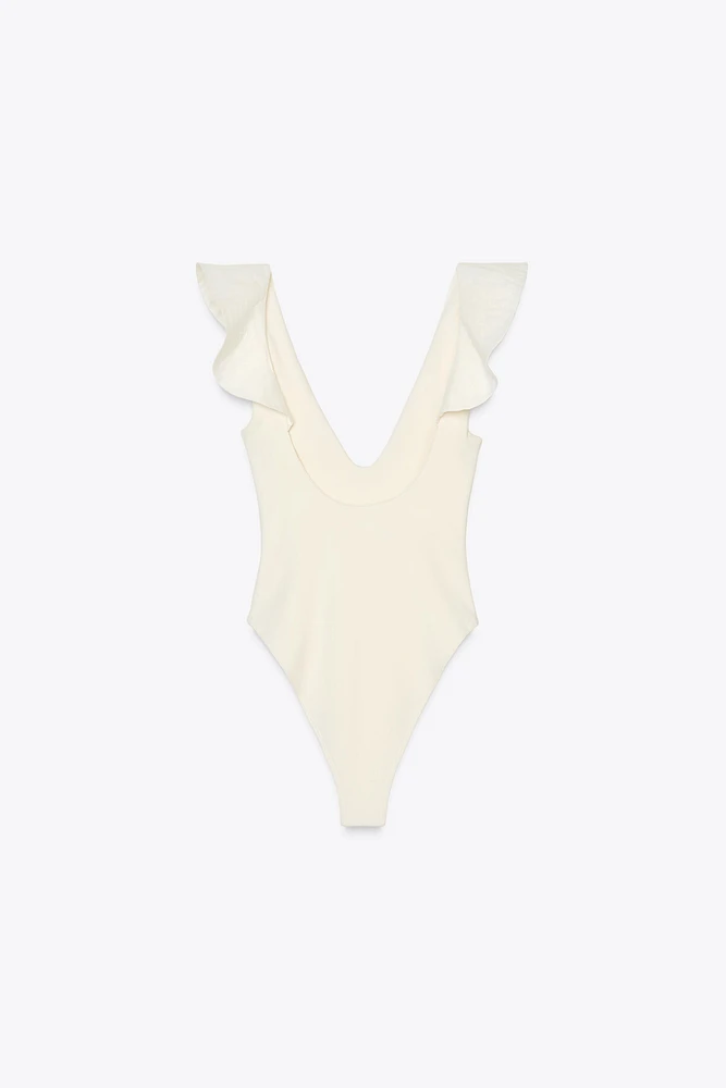 RUFFLED COMBINATION BODYSUIT