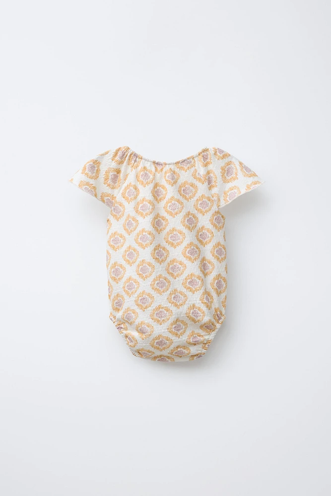 PRINTED BODYSUIT