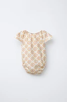 PRINTED BODYSUIT