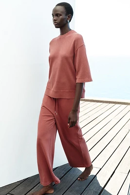 PANTALON LARGE EFFET DÉLAVÉ