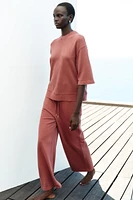 WASHED EFFECT WIDE LEG PANTS