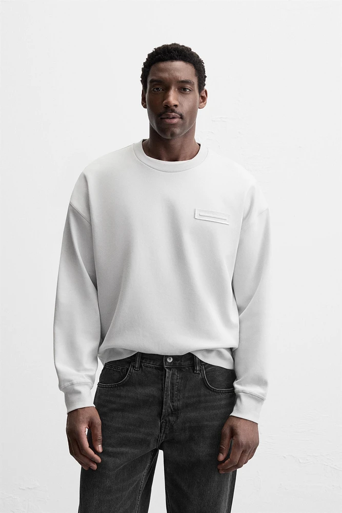 SWEAT RAS DU COU À PIÈCE