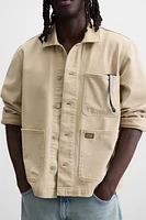 VESTE DÉLAVÉE À ÉCLABOUSSURES