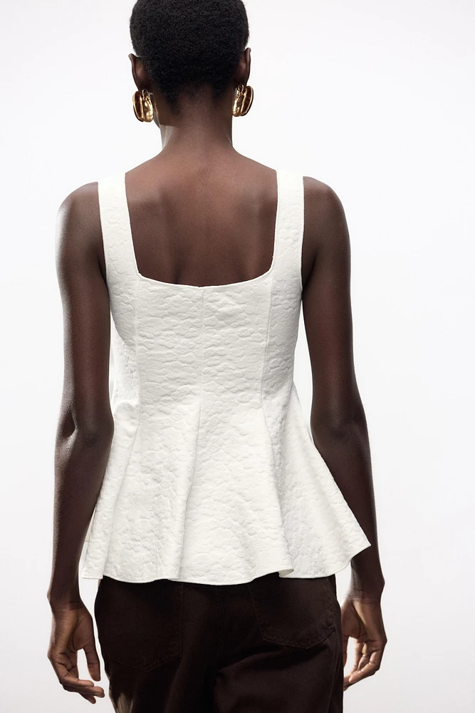 STRETCH JACQUARD PEPLUM TOP