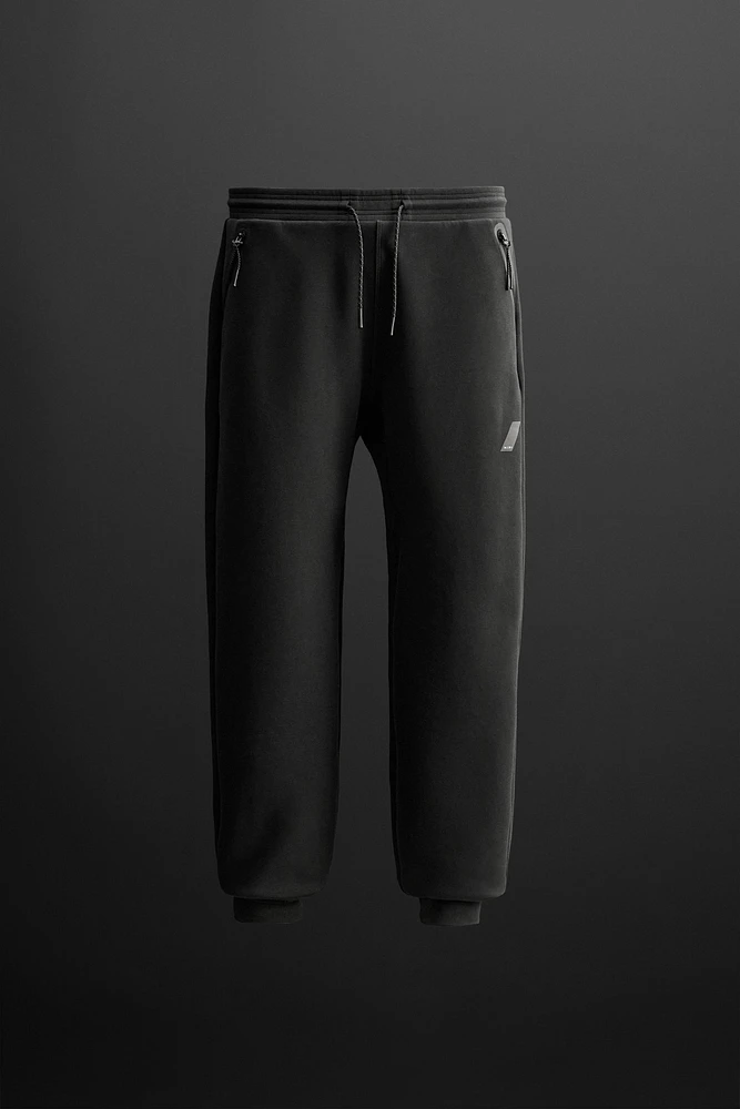 PANTALON DE JOGGING TECHNIQUE À ZIPS