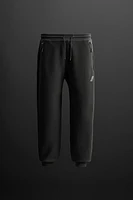 PANTALON DE JOGGING TECHNIQUE À ZIPS