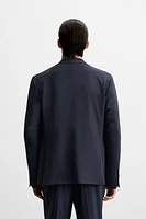 TEXTURED SUIT BLAZER