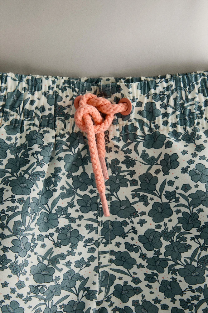 CHILDREN’S TROPICAL FLORAL BEACH SWIMSUIT