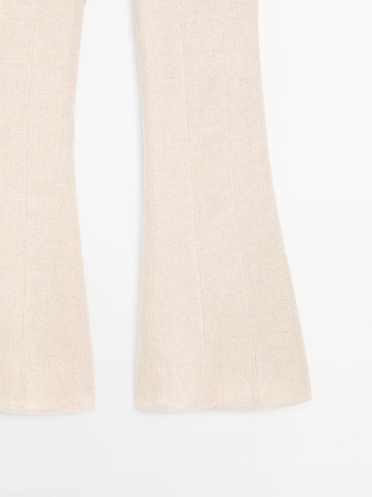 Pantalon flare taille contrastante