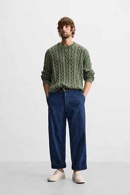 WASHED CABLE-KNIT SWEATER