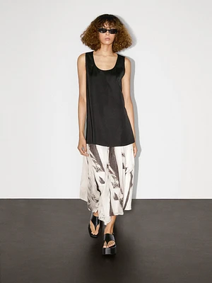 Long sleeveless satin blouse