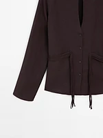 Flowing shirt with cord details