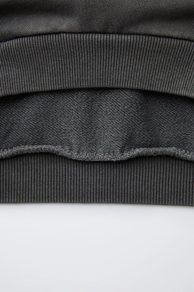 GILET À CAPUCHE PALMIER BRODÉ