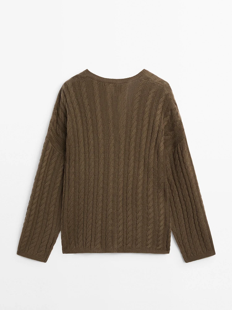 Cable-knit V-neck sweater