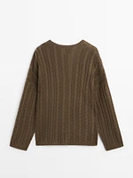 Cable-knit V-neck sweater