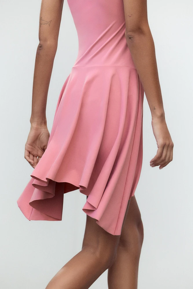 ROBE POLYAMIDE BAS ASYMÉTRIQUE