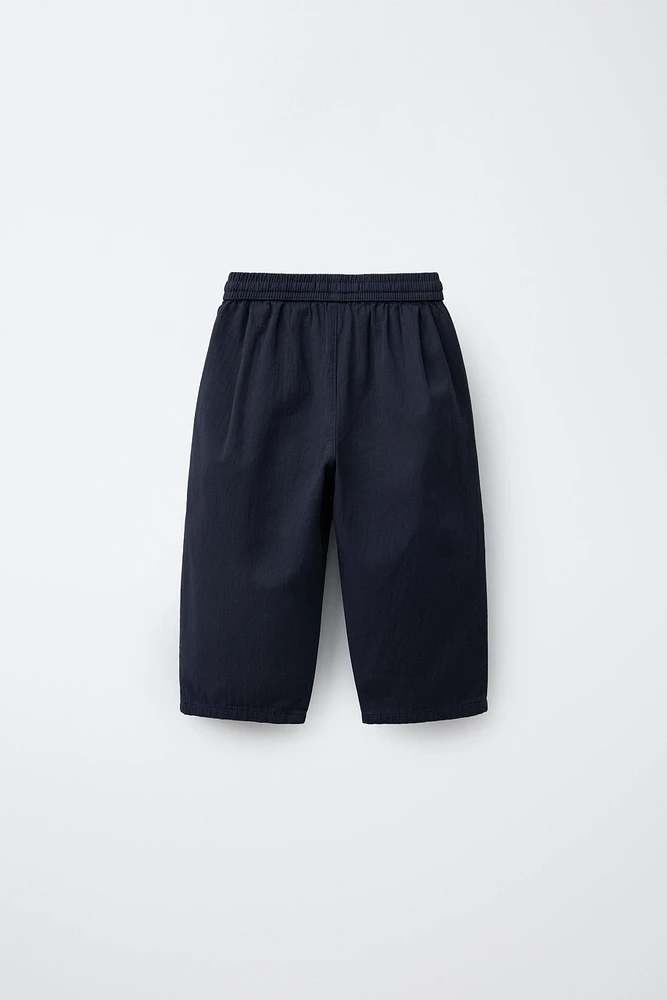 TEXTURED BAGGY PANTS