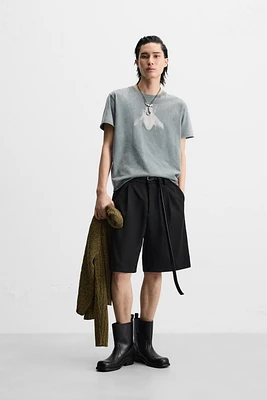 TEXTURED PLEATED SHORTS