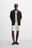 RELAXED FIT FLOWY SHIRT