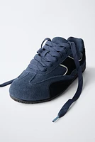 BASKETS EN CUIR