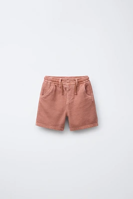 BERMUDA STANDARD TOUCHER DOUX