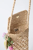 RAFFIA EFFECT PHONE CASE WITH CHARM