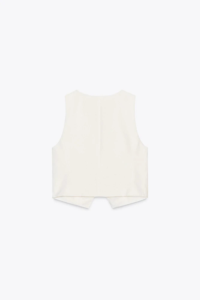 GILET À POCHES LISERÉ