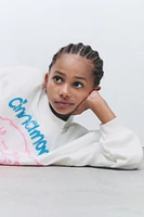 CINNAMOROLL © SANRIO RAISED GLITTER SWEATSHIRT