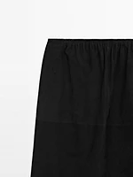 Jupe détail dentelle cuir finition daim