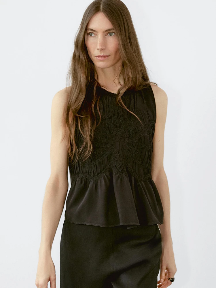 Flowing halter top with gathered detail