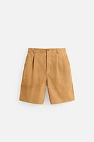 PLEATED SUEDE SHORTS