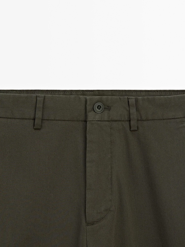 Cotton blend textured slim fit trousers