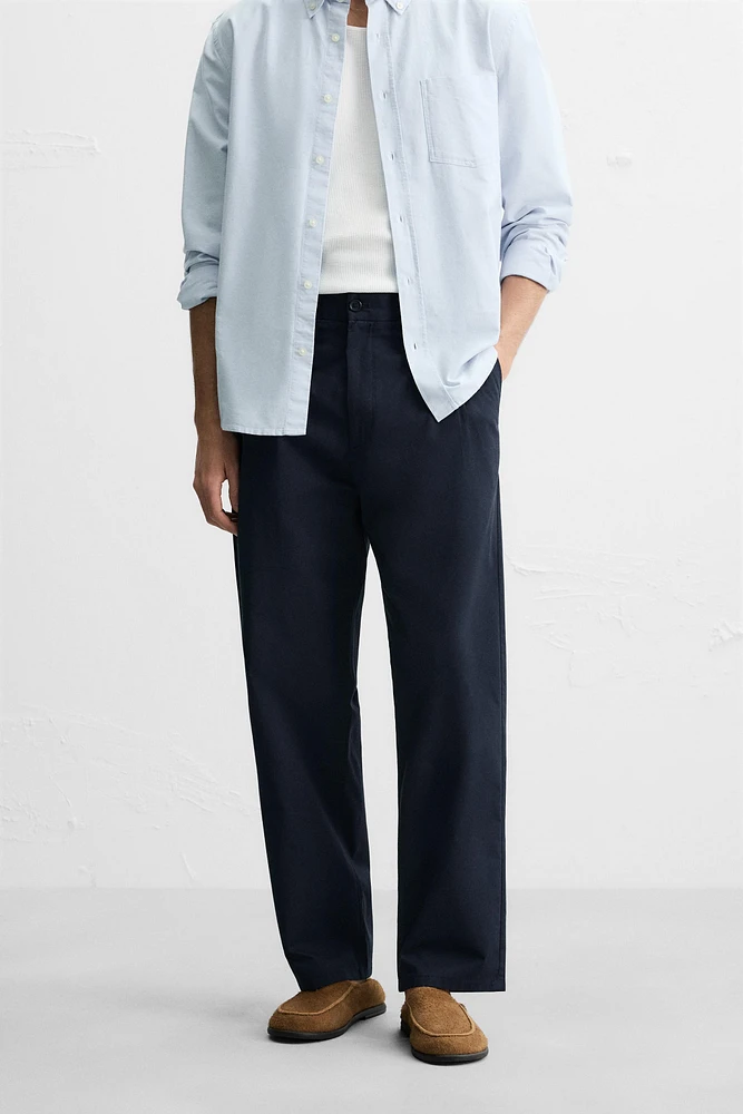 PANTALON REGULAR FIT À PLIS