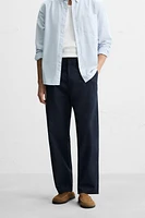 PANTALON REGULAR FIT À PLIS