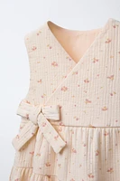 ROBE-SALOPETTE STRUCTURÉE À FLEURS