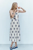 ROBE MI-LONGUE BRODÉE CUT OUT