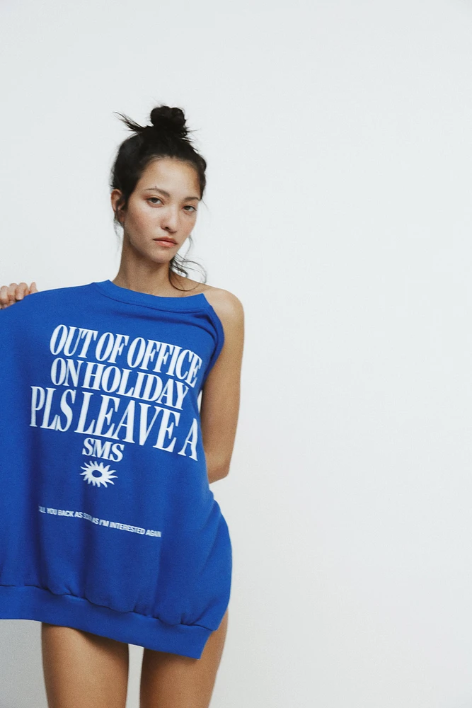 PRINTED SLOGAN SWEATSHIRT