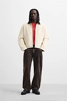 BLOUSON AVEC COL BIMATIÈRE
